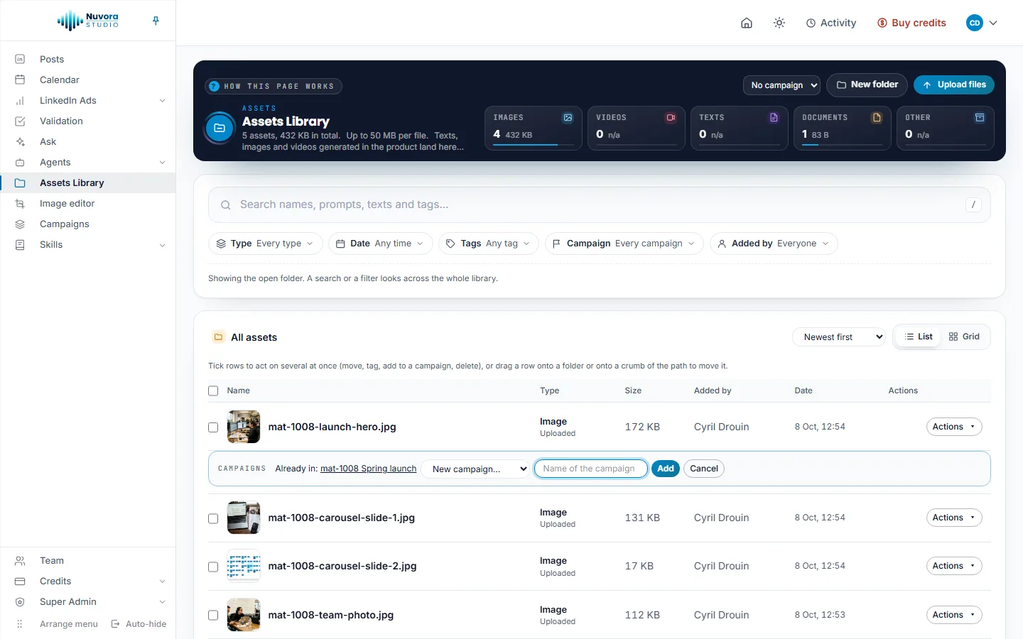 The Assets Library with five files of a test team: under the first row, mat-1008-launch-hero.jpg, the Campaigns strip says Already in: mat-1008 Spring launch, with the campaign list on New campaign…, the Name of the campaign field, Add and Cancel